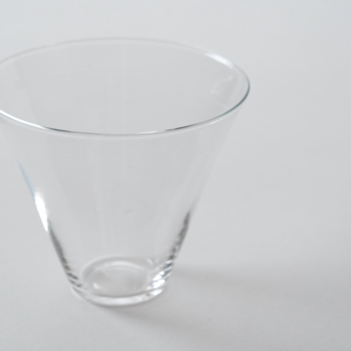 Clear glass cup on a white background