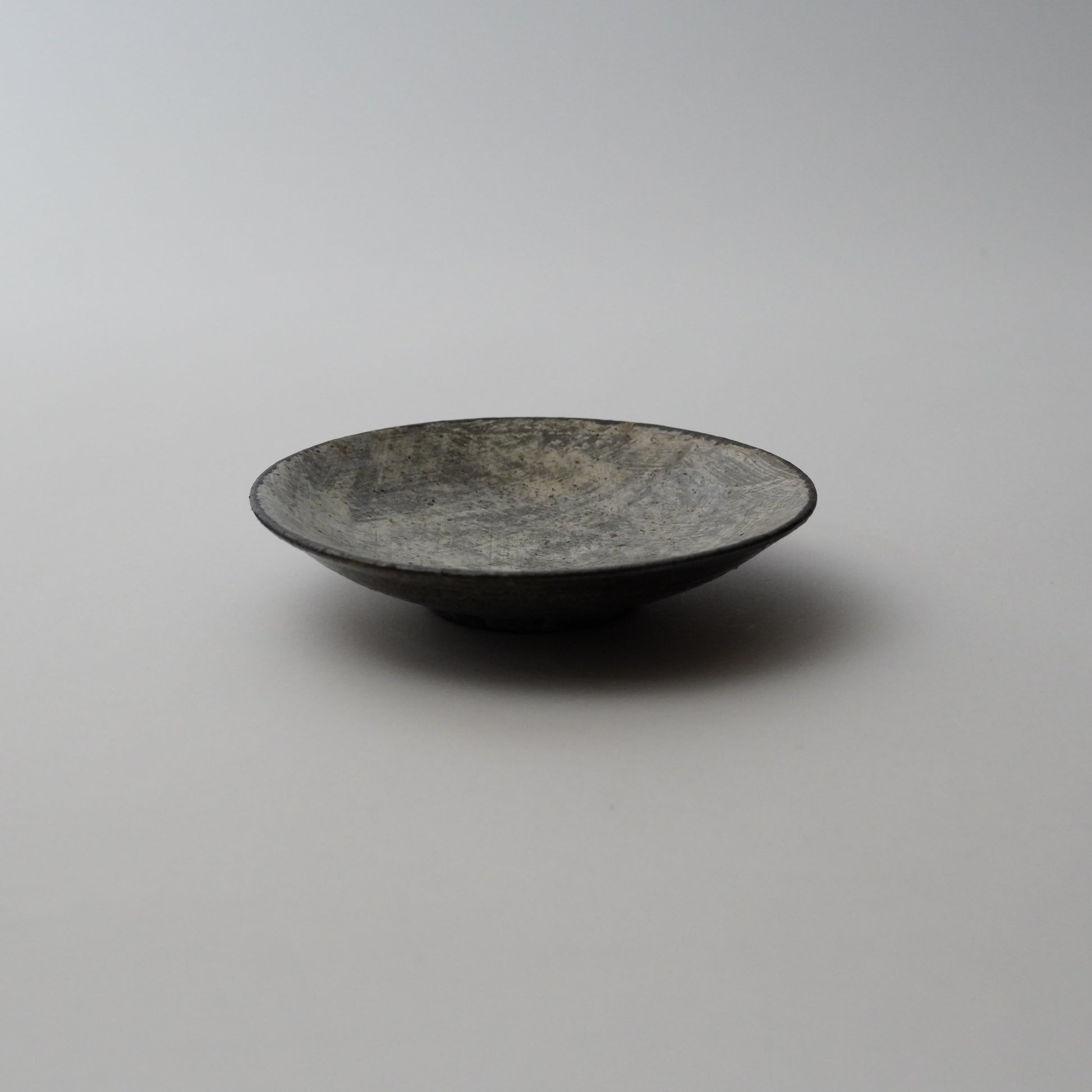 ceramic bowl on a gray background
