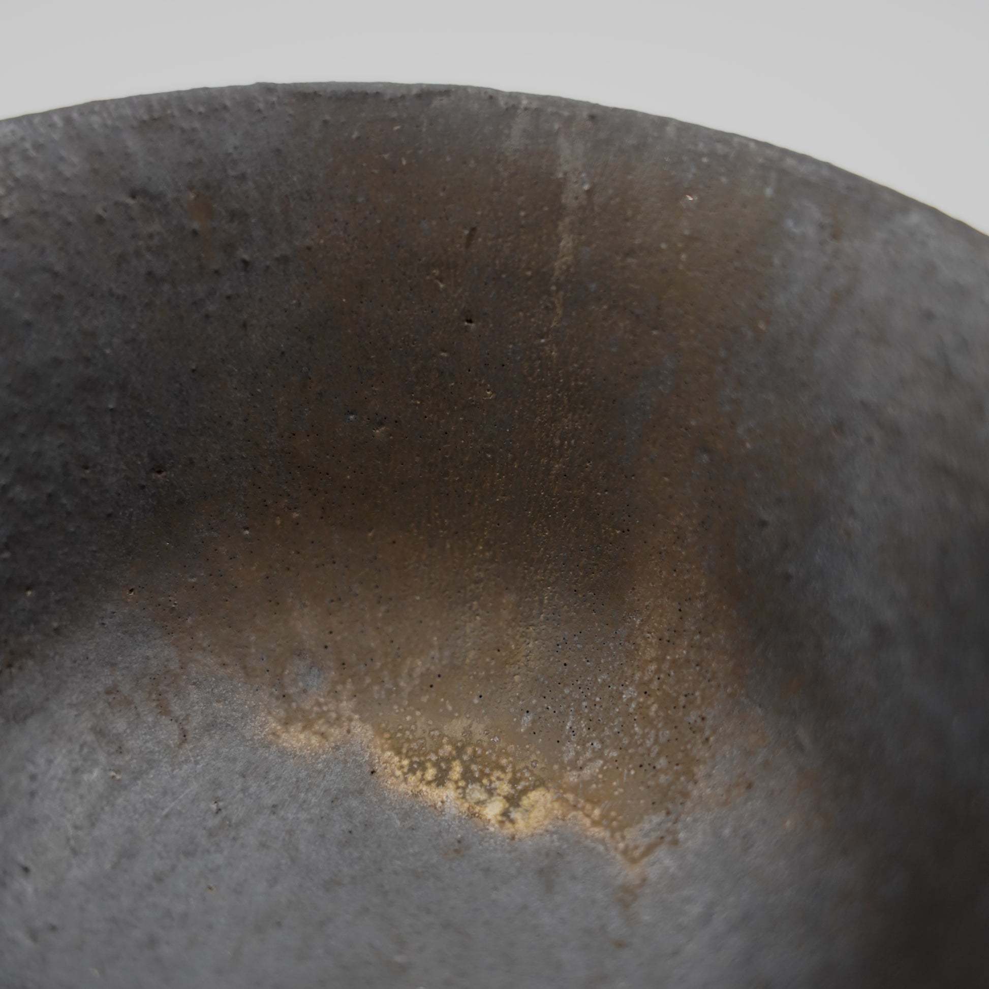 Close-up of a metal surface with rust and discoloration