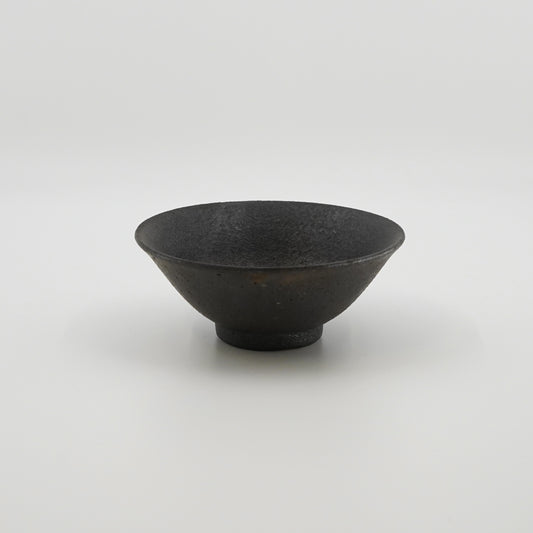 a black color bowl on a white background