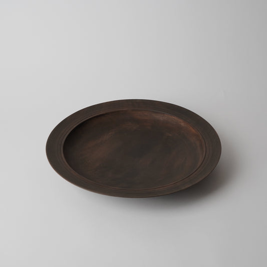 Wooden tray on a light gray background