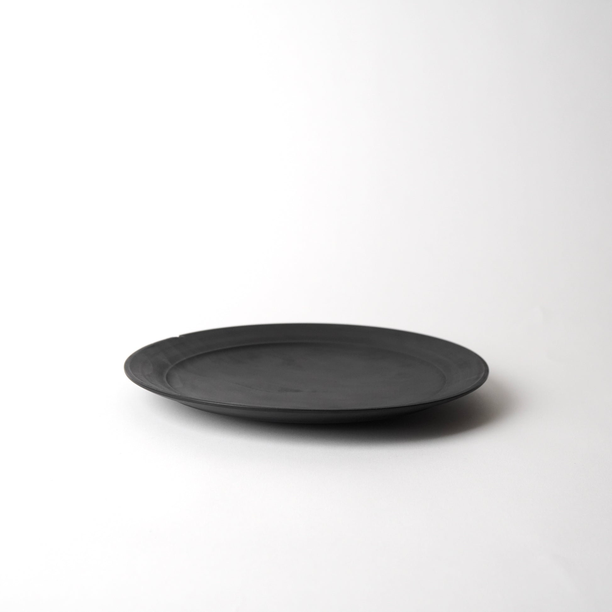 Black plate on a white background