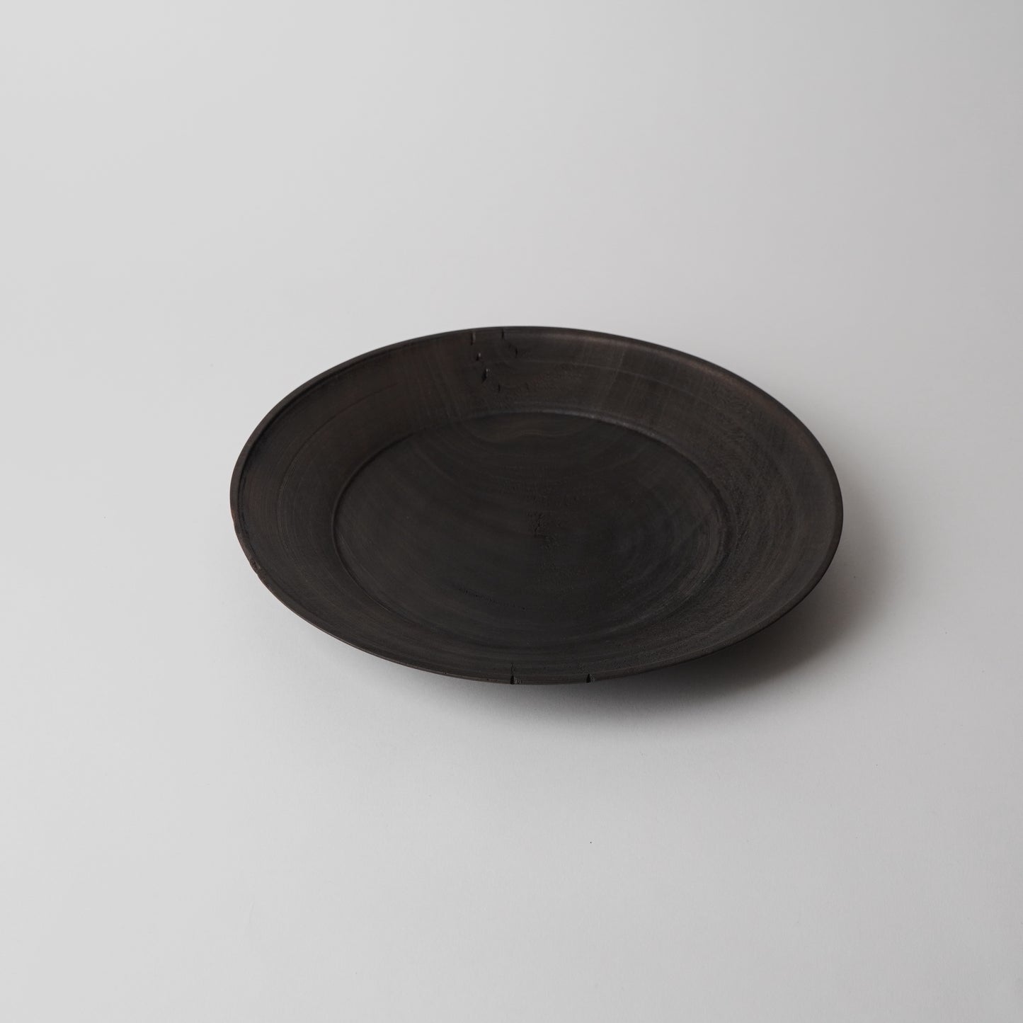Black plate on a light gray background