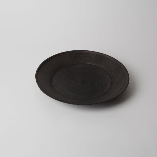 Black plate on a light gray background