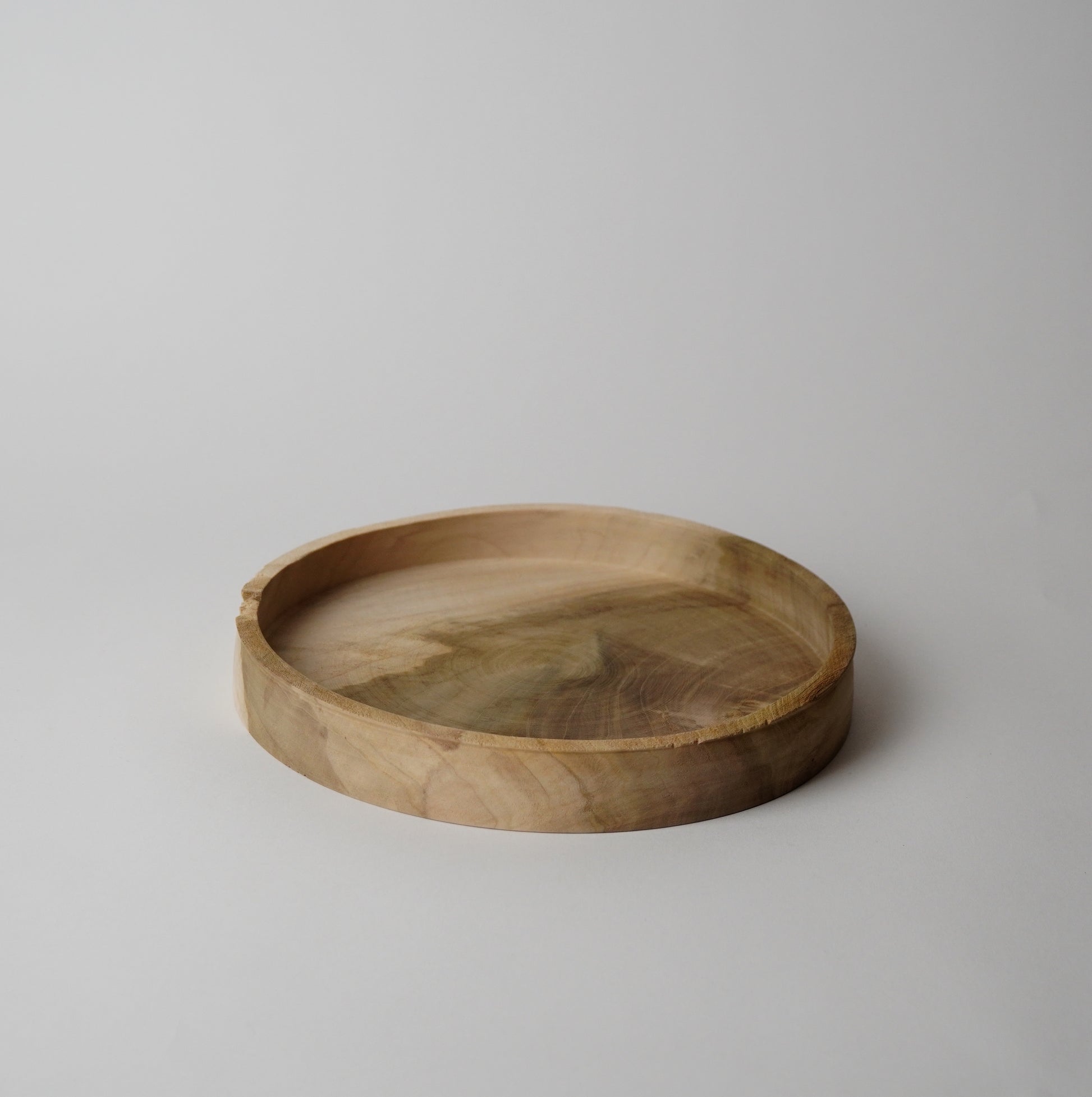 Wooden tray on a plain background