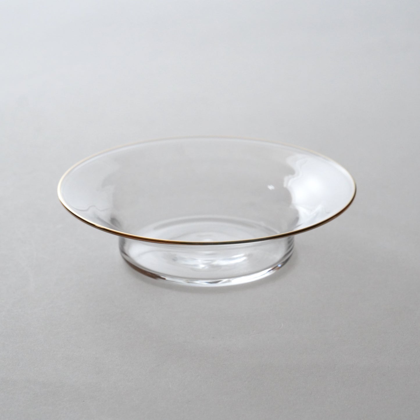 Clear glass bowl on a white background