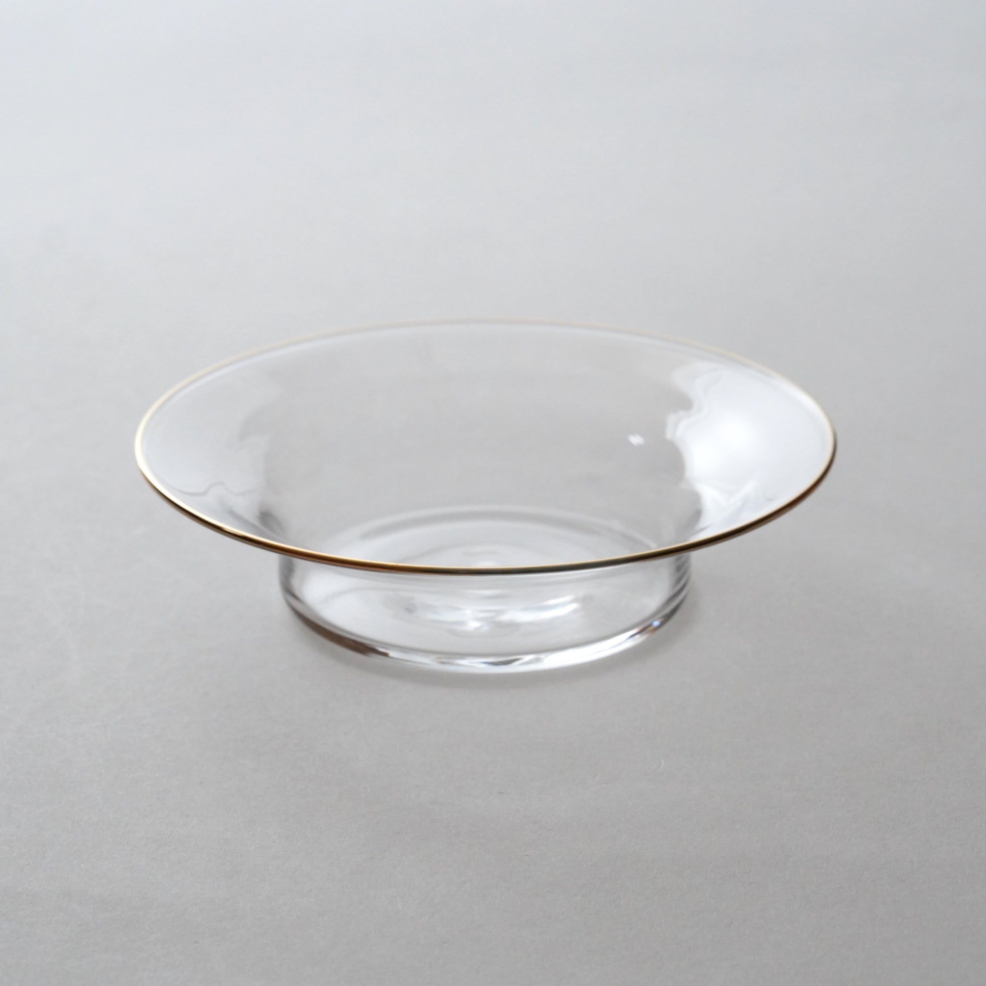 Clear glass bowl on a white background