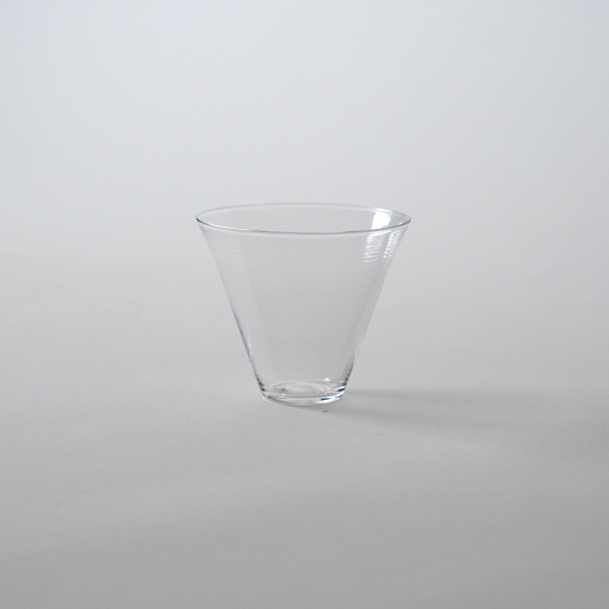 Clear glass vase on a white background